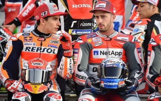 Marc Marquez (SPA) Andrea Dovizioso (ITA) MotoGP GP Qatar 2018 (Circuit Losail) 16-18.03.2018 photo: Michelin