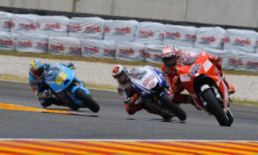 Jorge Lorenzo Yamaha Casey Stoner Ducati durante una carrera de MotoGP
