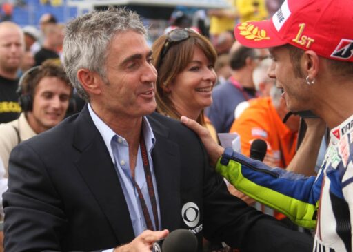 Valentino Rossi y Mick Doohan en el parque cerrado de MotoGP