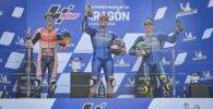 Alex Rins, Álex Márquez y Joan Mir en el podio de Aragón